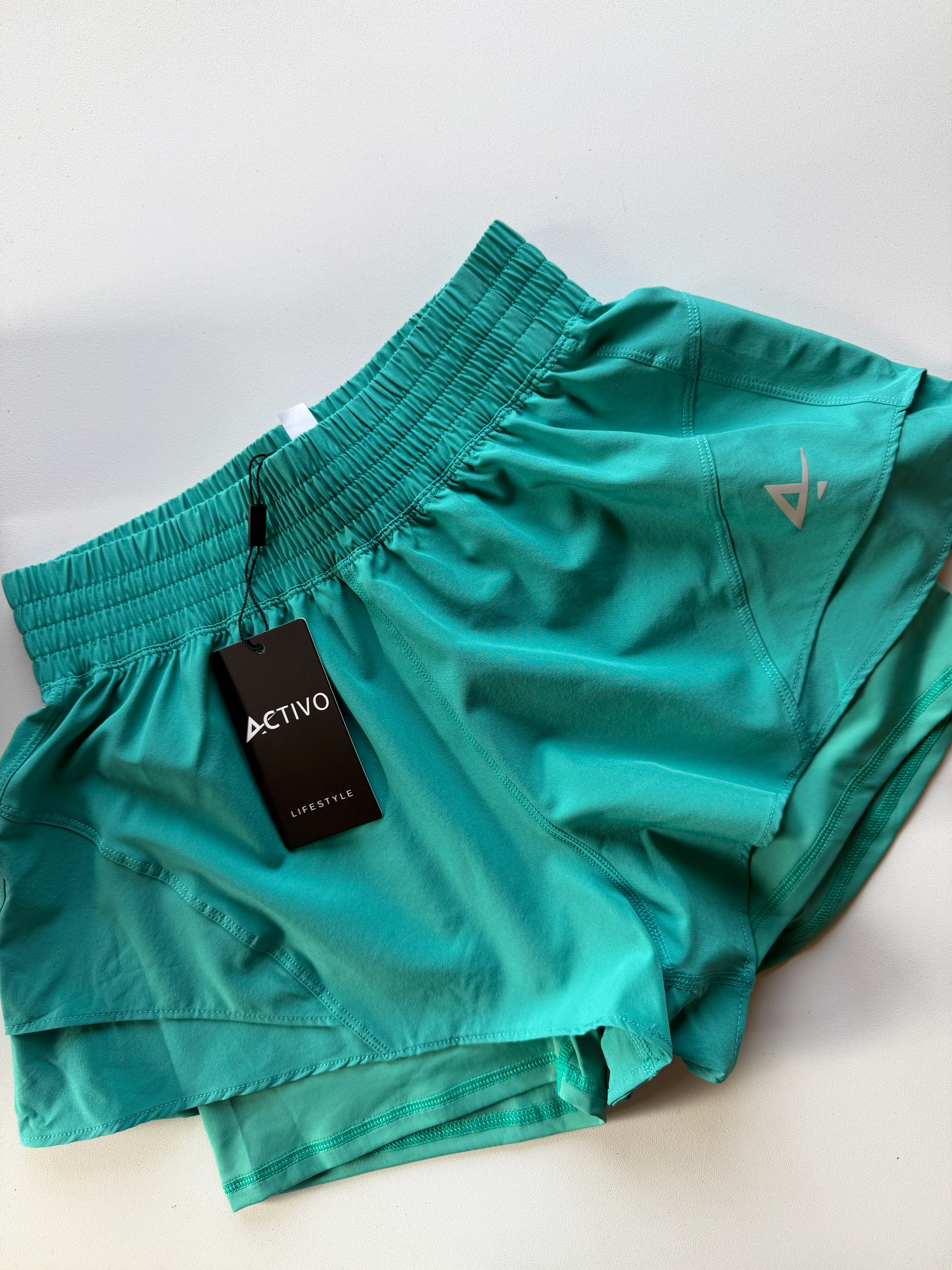 Activo flowy running short