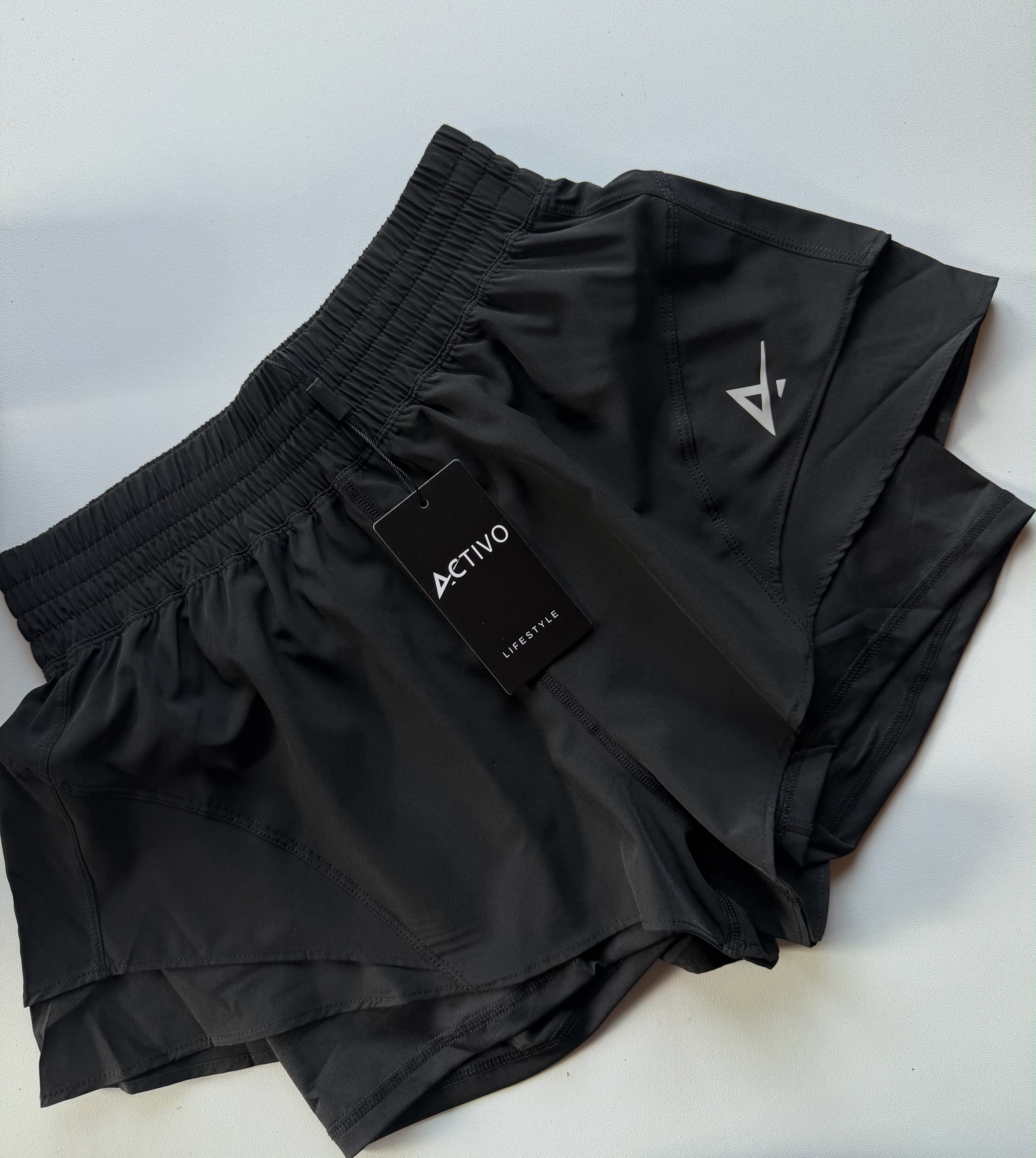 Activo flowy running short